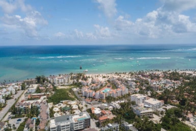 los corales drone aerial photo of beach and apartments